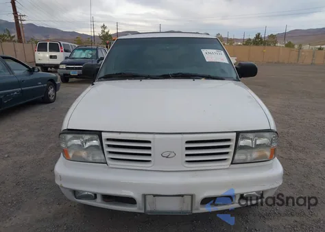 2000 Oldsmobile Bravada из США, поврежденный, VIN 1GHDT13W5Y2219674